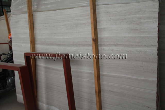white wood grain marble slabs